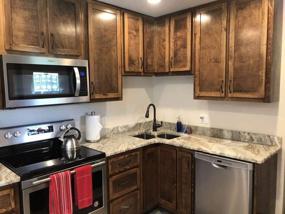 Kitchen sink and dishwasher.