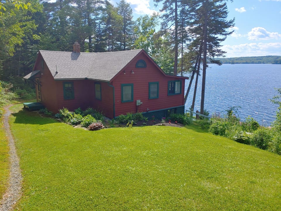 Dramatic views of the lake, Quanahawsset is your sanctuary on Damariscotta Lake.