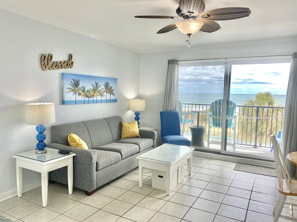 The condo is 550 square feet, with a welcoming view of the pond and Ocean!  The living space features, a full size pull out sofa sleeper, 50" Roku TV, & two storage cubes under the coffee table to double as a small table and chairs for small children.