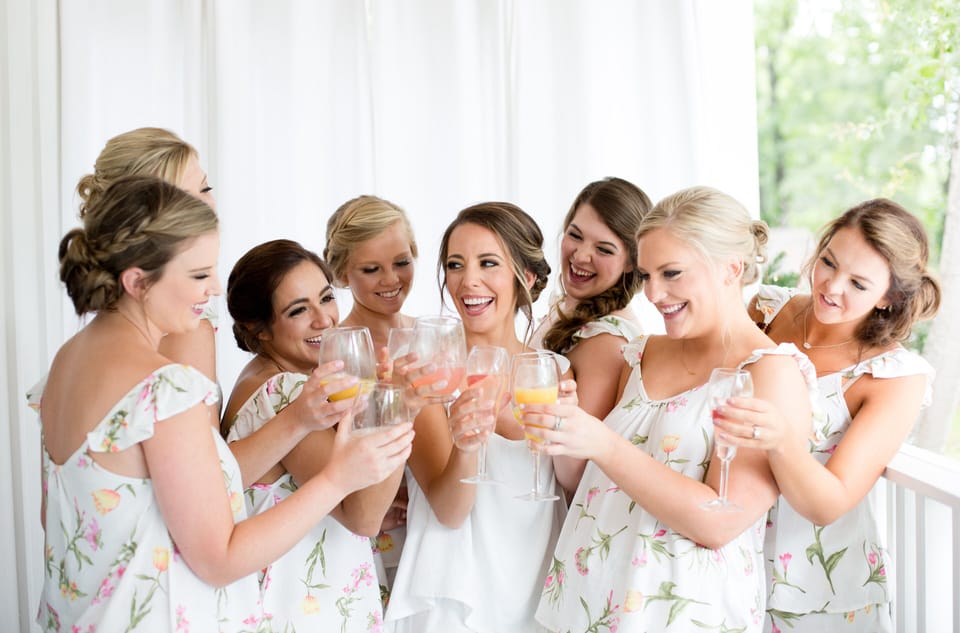 Mimosas on the balcony while getting ready for a big wedding day
