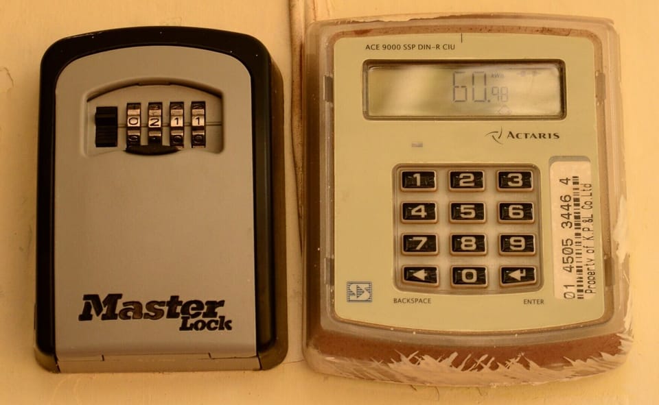 Self check in and access through key box system
