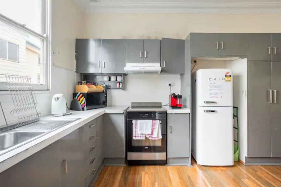 Induction cooker and red coffee machine.