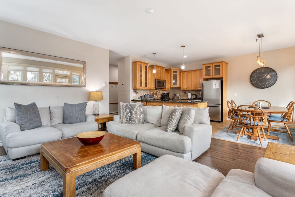 Hardwood floors and comfy oversized furniture