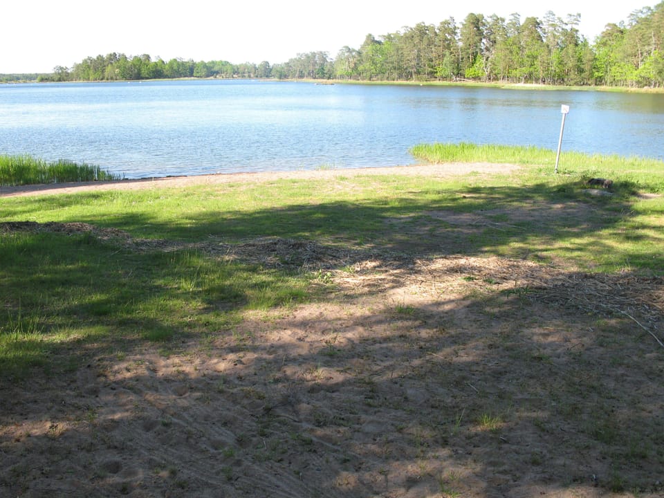 Small sand beach some 700 meters from the house