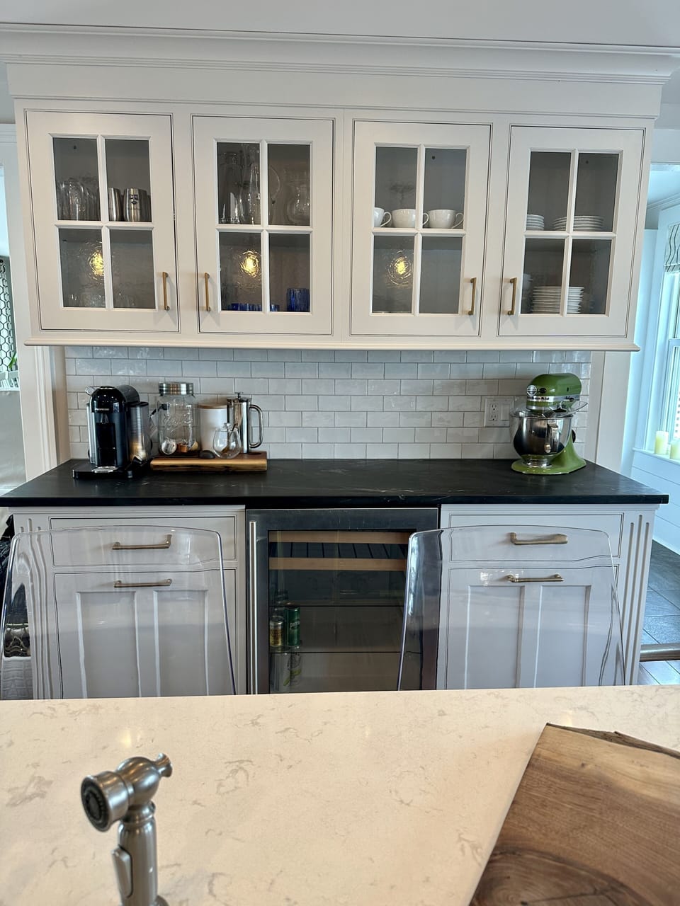 Nespresso bar with pods, wine fridge
