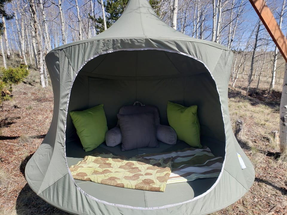 Tree Cabana, great place to relax w/ a book. In backroom pls put away after use.