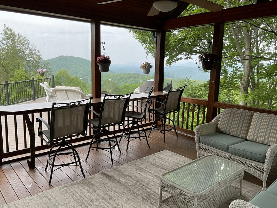 Screen porch views on a cloudy day.