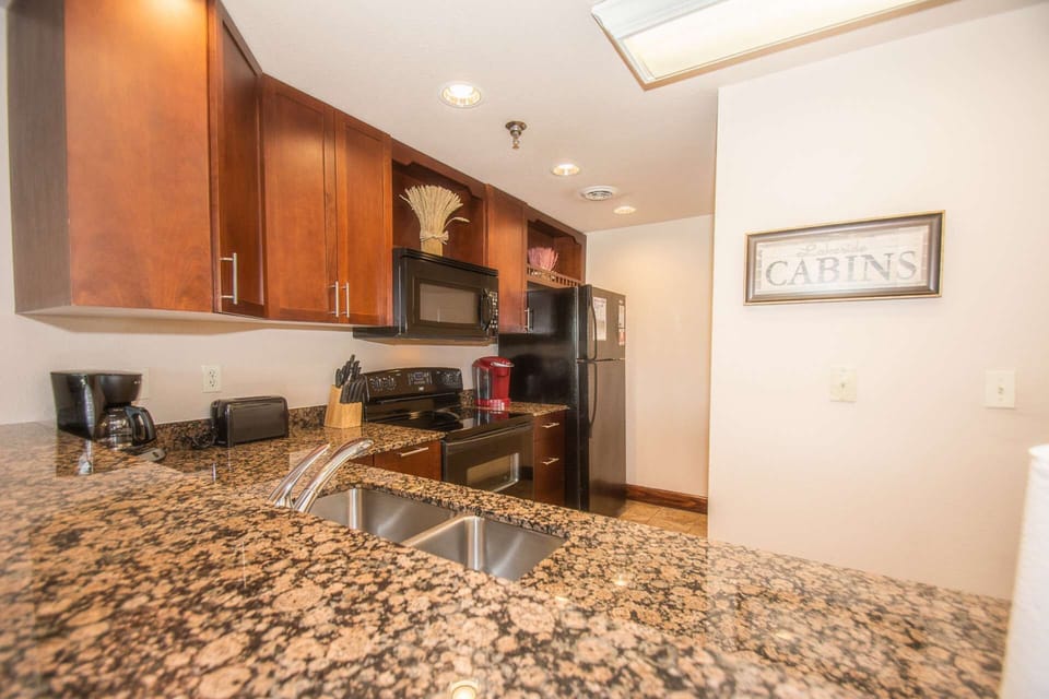 Why wait for a table? The kitchen is well-equipped with everything you need to prepare a meal in.