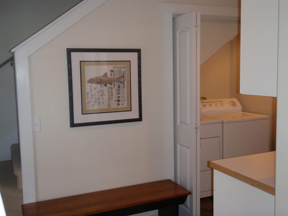 Utility area with industrial sink, washer and dryer