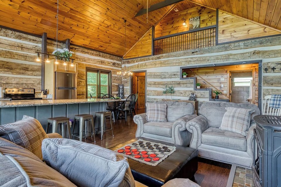 Living area with fireplace and natural light