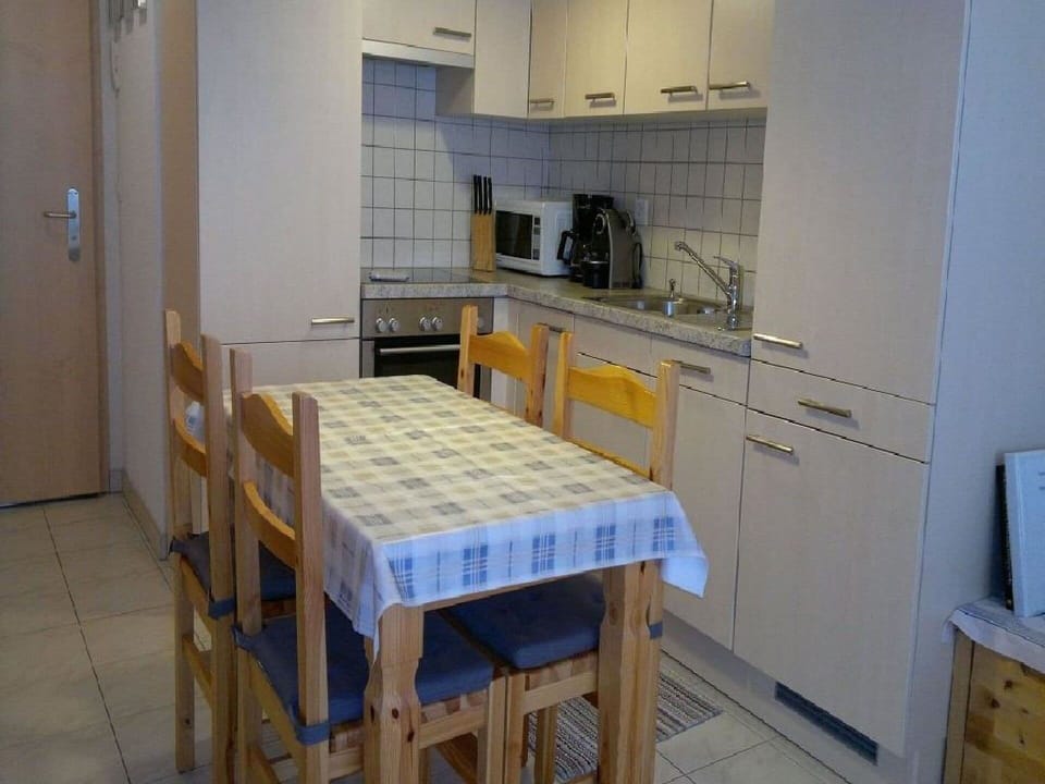 Cabinetry, Property, Furniture, Table, Countertop, Kitchen Sink, Chair, Wood, Interior Design, Drawer