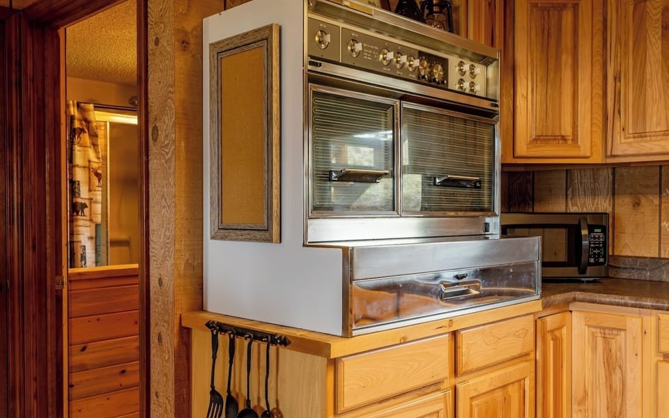 Vintage stove in the kitchen is a unique feature of the cabin