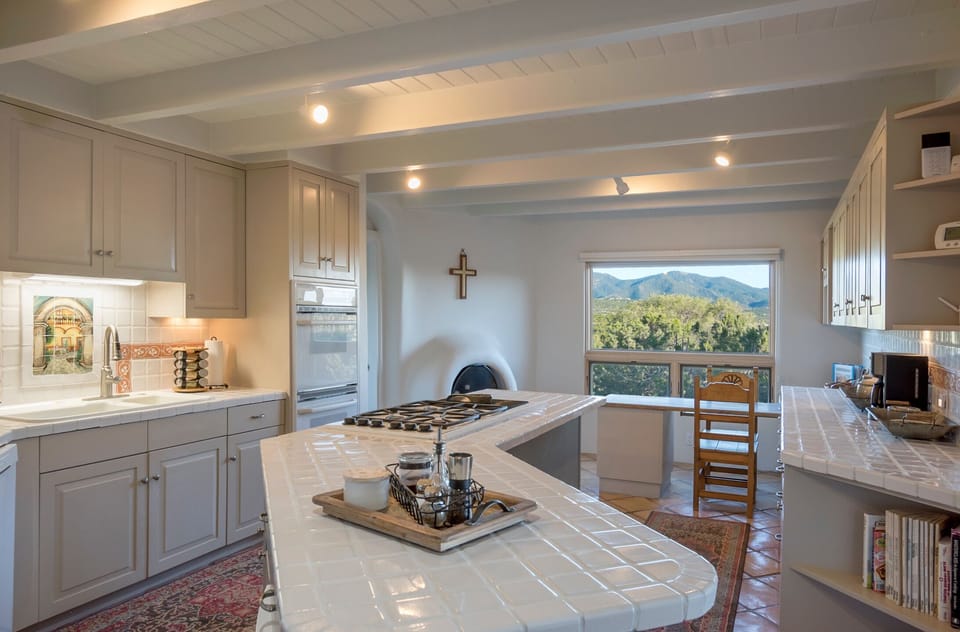 Huge, fully equipped kitchen w/ gas Dacor range & tons of storage/counter space