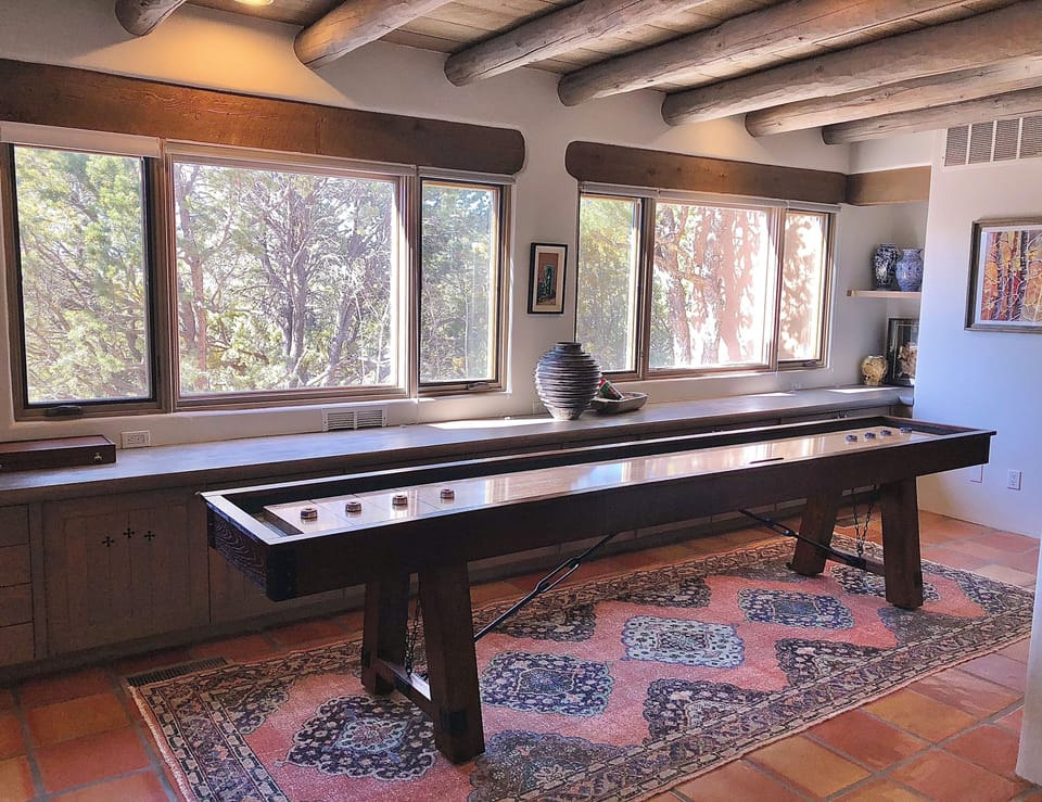 New 12' shuffleboard table in living room alcove