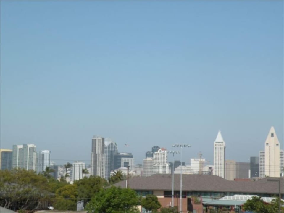 Views of SD skyline, Petco Park & seasonal fireworks displays from rooftop deck