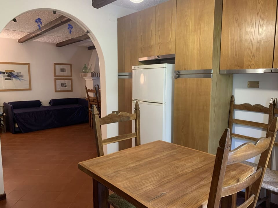 Furniture, Table, Property, Cabinetry, Wood, Building, Couch, Refrigerator, Chair, Interior Design