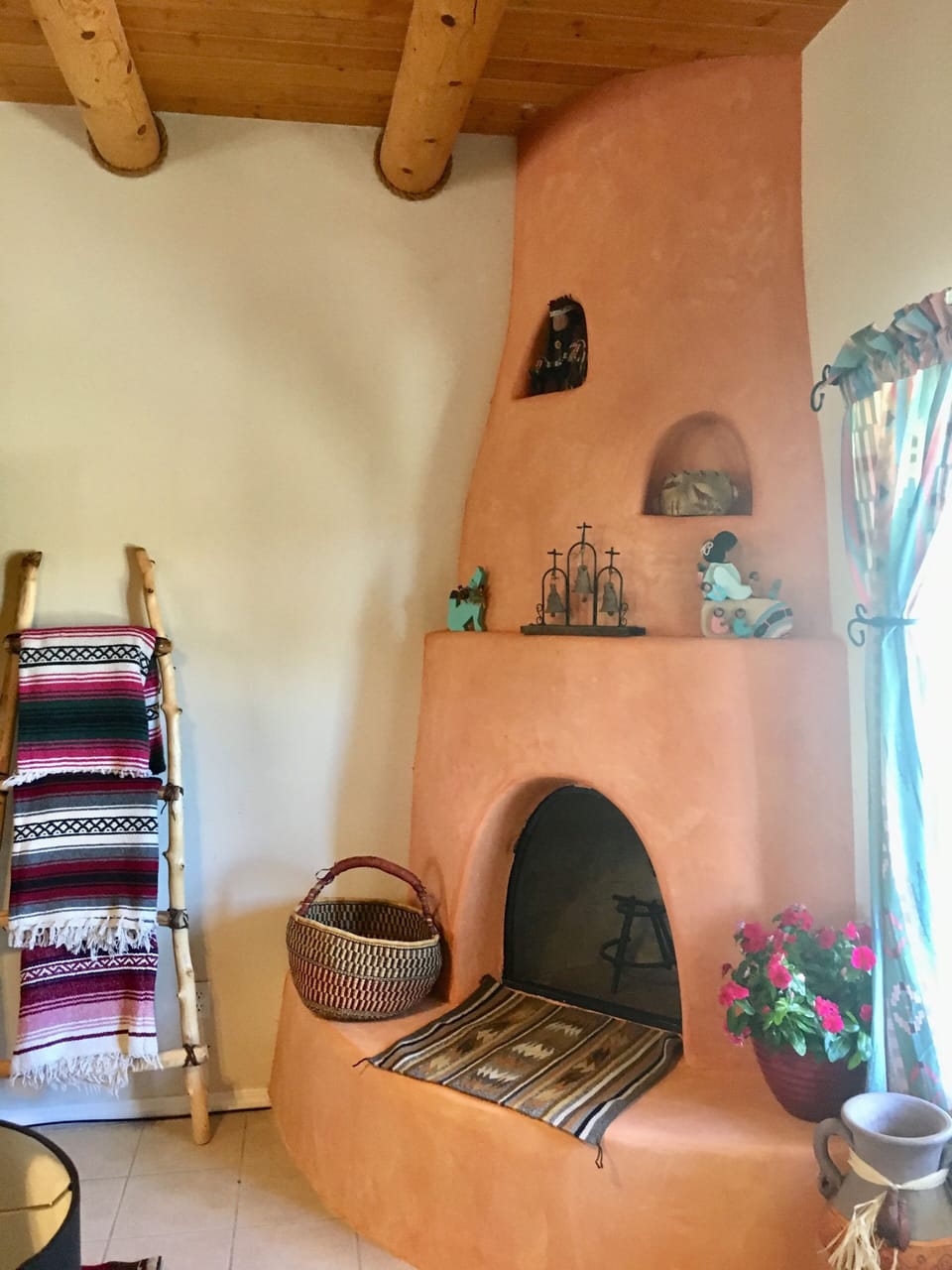 Southwest Decor on and around Kiva fireplace.
