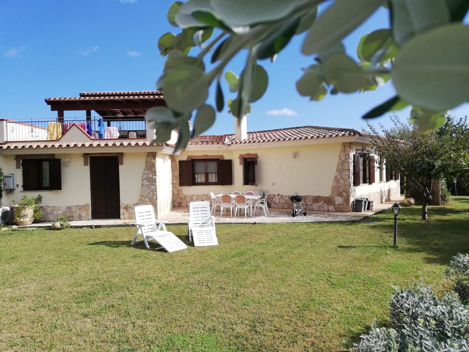 Back side of the villa and  garden