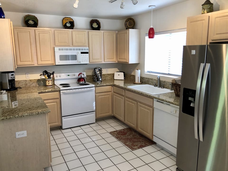 Kitchen---Fully Stocked With All Utensils 