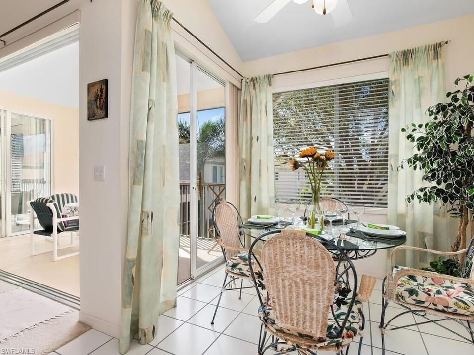 Dining alcove off of kitchen with patio access. Note: now floors are hardwood.