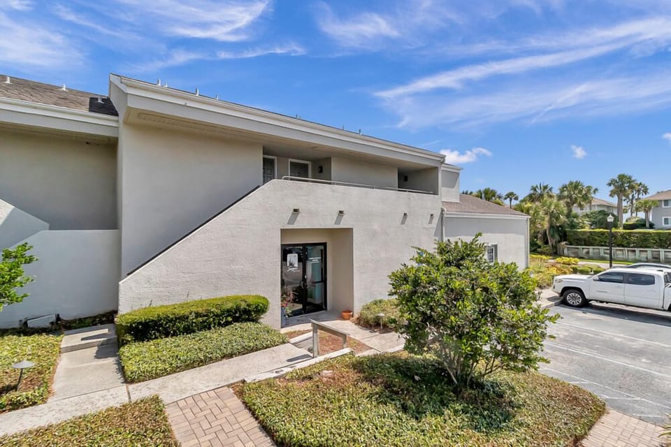 Clean and convenient condo entry with easy parking and private access.