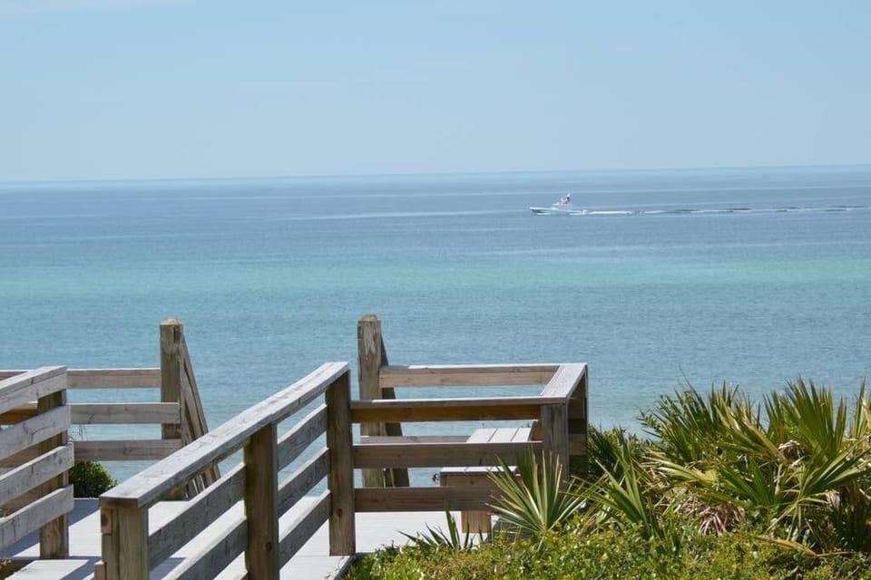 Walkover to crystal clear water and white sands