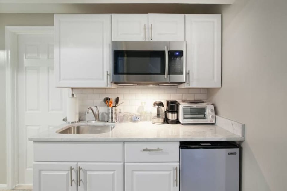 Renovated kitchenette with toaster oven, hot plate and microwave