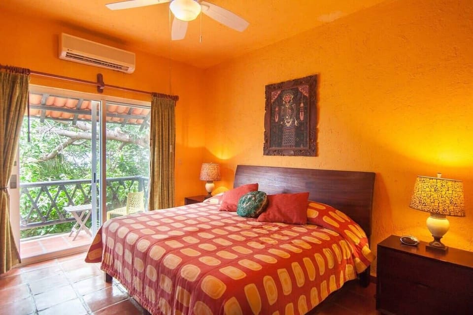 This condo is a celebration of the spirit of Playa! Pictured here, the master bedroom