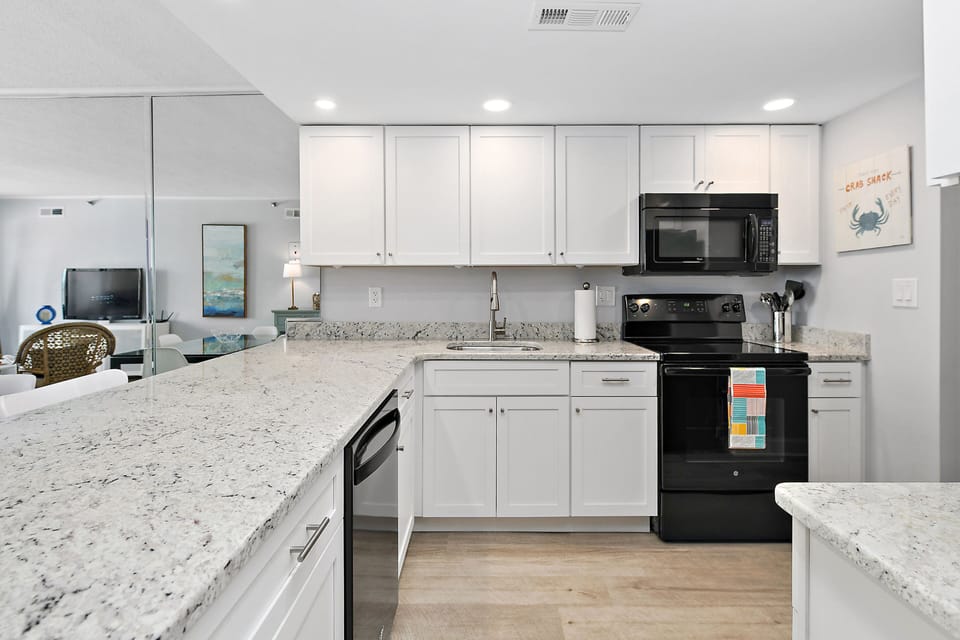 Full kitchen: dishwasher, microwave, oven, Keurig coffee maker, toaster, blender