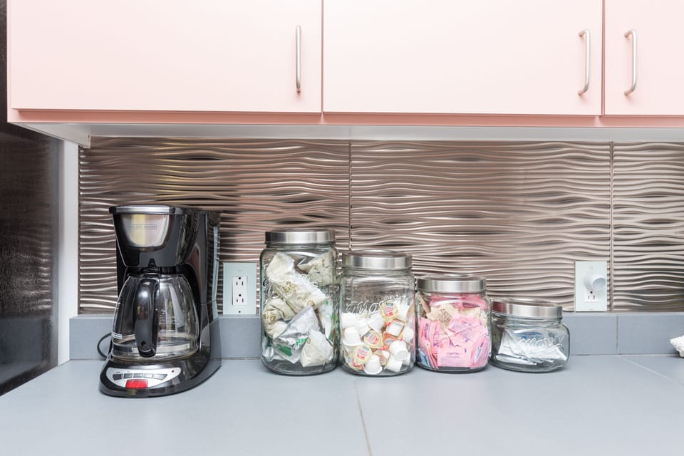 Coffee bar provided for you. Coffee, creamers, sweetners and filters