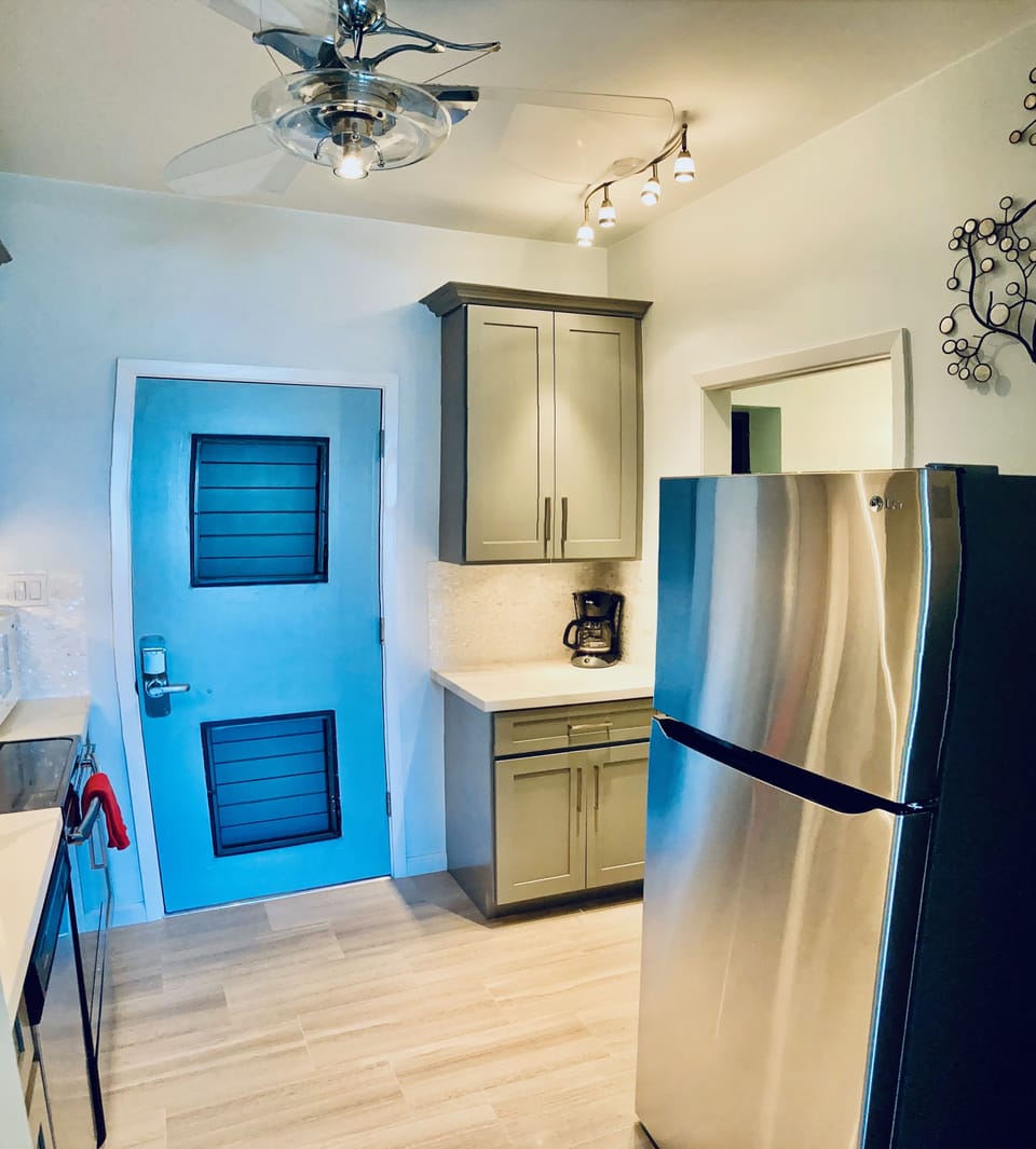 Kitchen with cookware and dishes