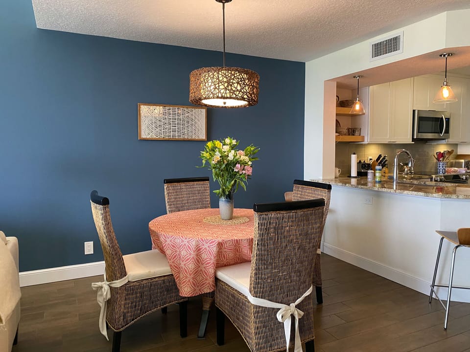 Dining table with glass top and seating for 6