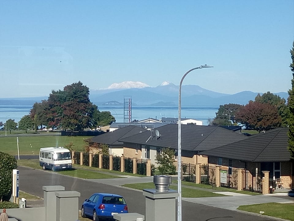 View of Lake Taupo and mountains from the upstairs living areas.