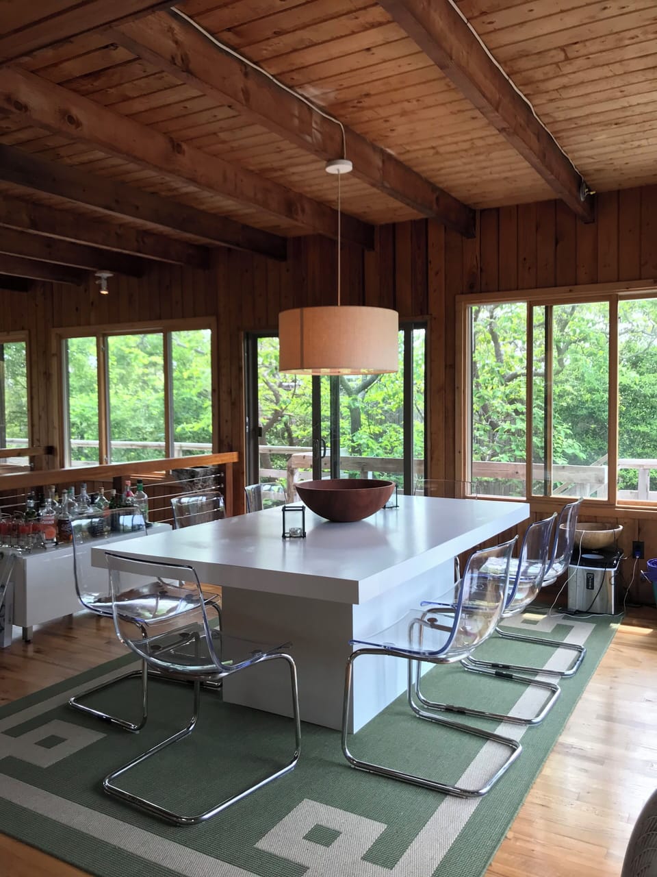 The living area has wrap around windows providing ample sunlight