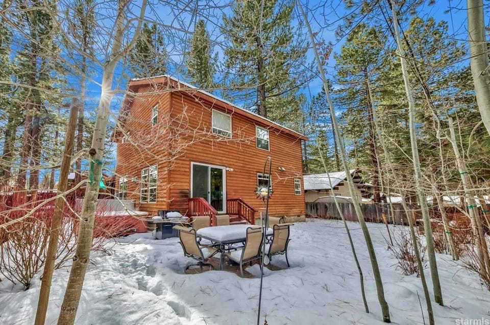 good size yard with hot tub, BBQ grill and outdoor furniture