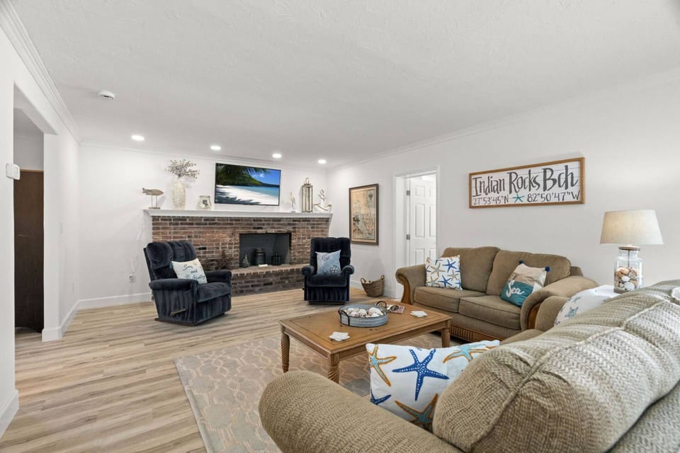 Main Level Living Room with Sofa, Loveseat, and 55" TV