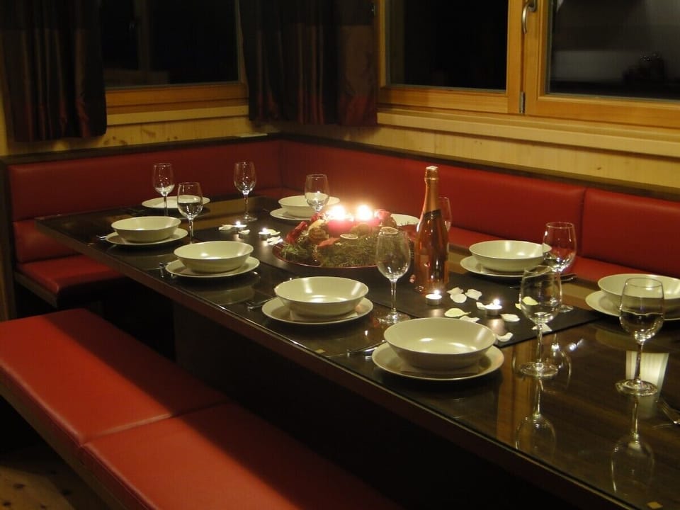 leather dining sofa and walnut table