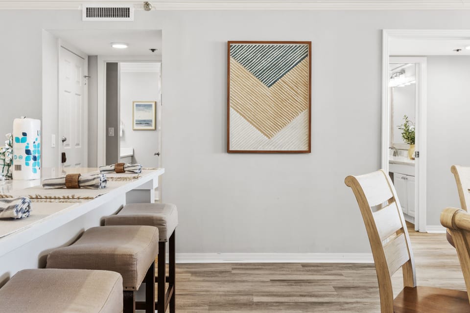 Dining area for six and additional bar seating for four