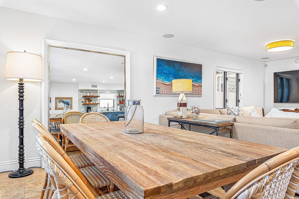 Front door is pictured on the far left. It opens up to the dining area, with plenty of seating.
                