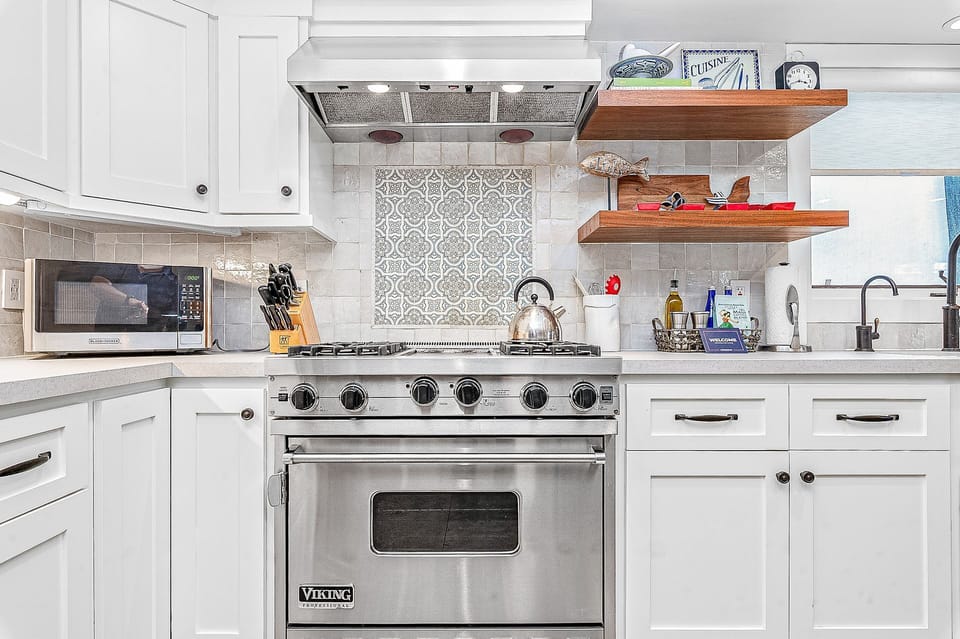A well-equipped culinary space with timeless coastal charm
                