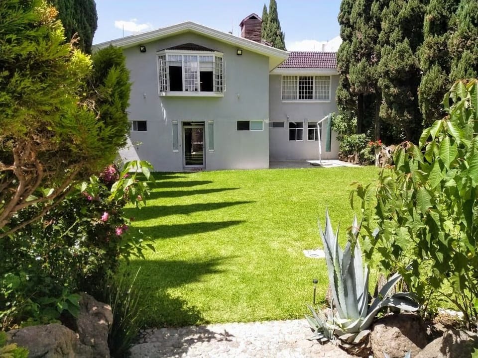 Jardín "Estancia Boutique O". 