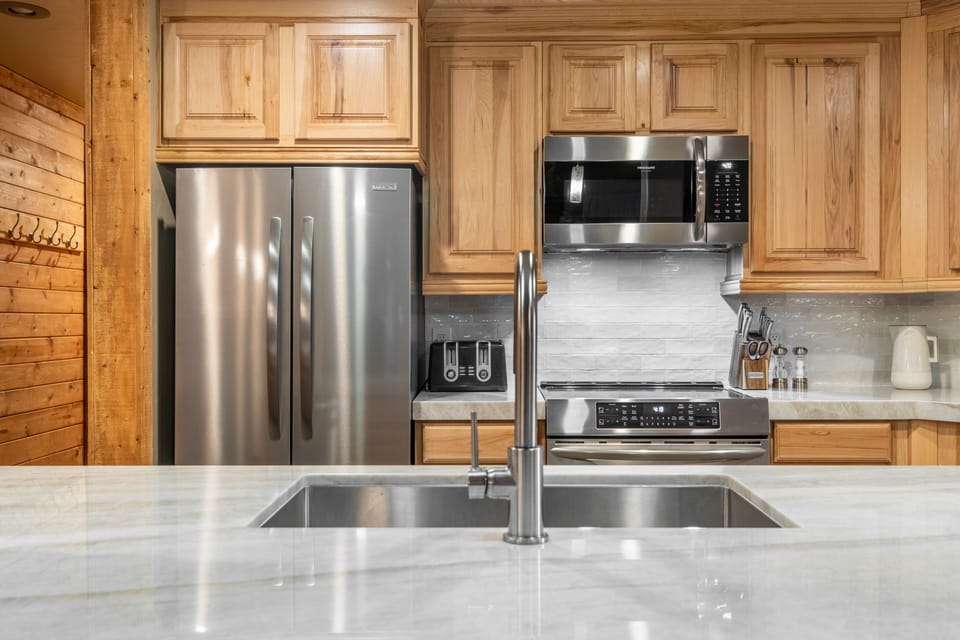 Kitchen with new counters and appliances