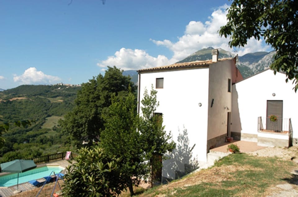 the house, the pool and the view