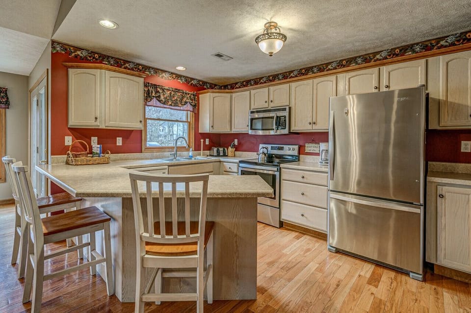 Cozy kitchen with a functional layout and modern amenities perfect for quick meals and gatherings.