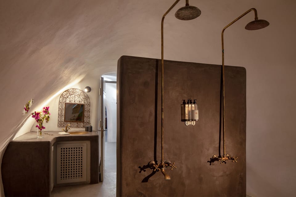 A super huge & exceptional bathroom with two shower seats.