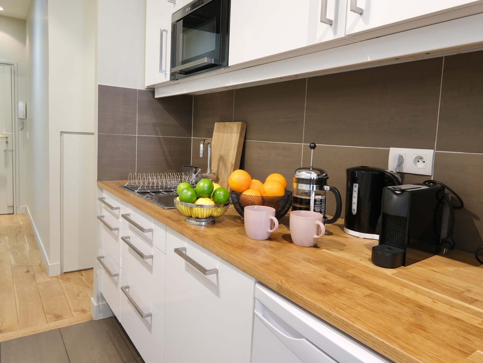 Well Equipped Kitchen with Cookware and Utensils
