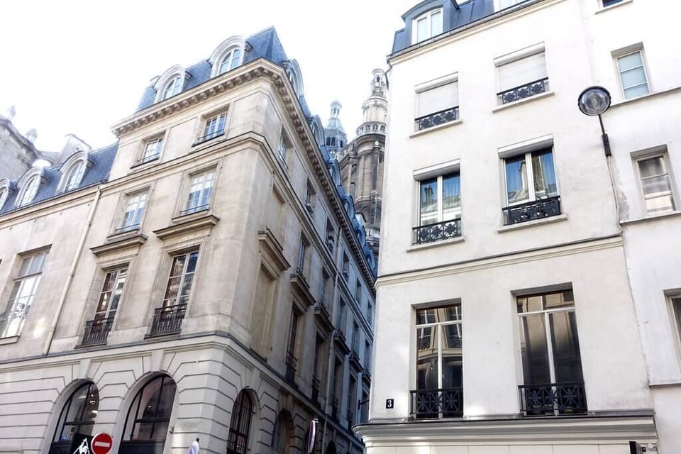 Apartment's rue Montmartre facade.  Views onto church from bedroom skylight