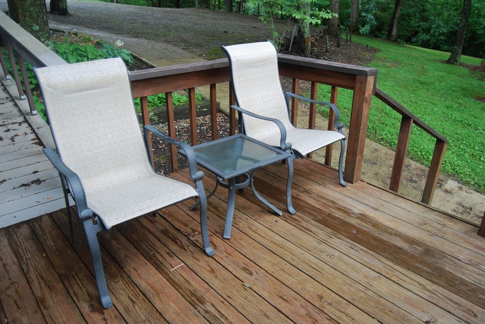 Deck with two chairs.  Also has  bistro table and two chairs not shown.
