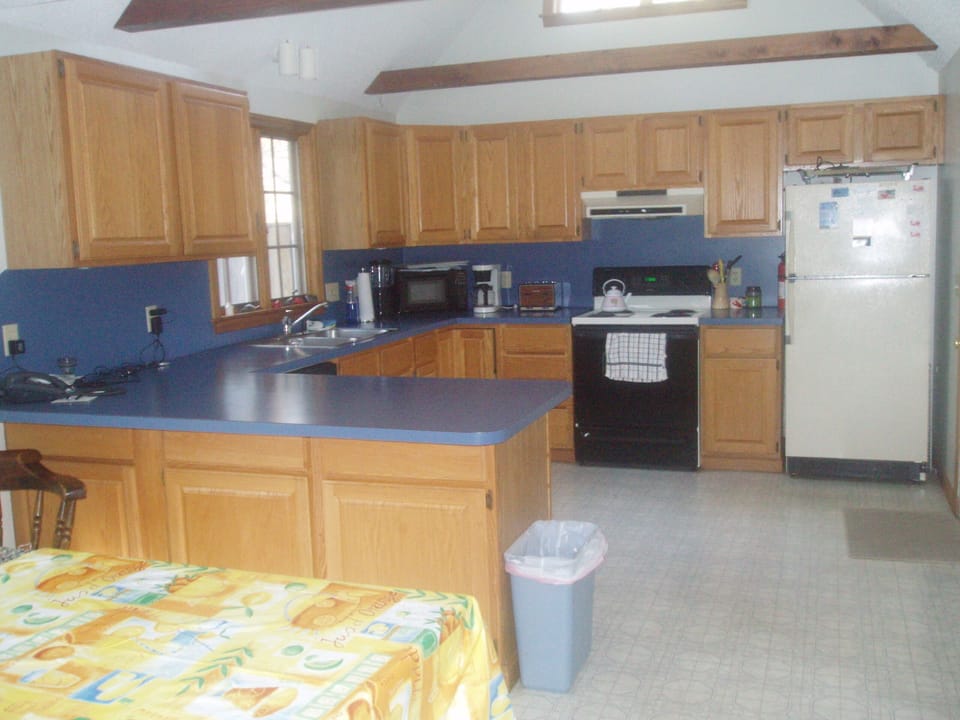 The full kitchen with dish washer and  garbage disposal 