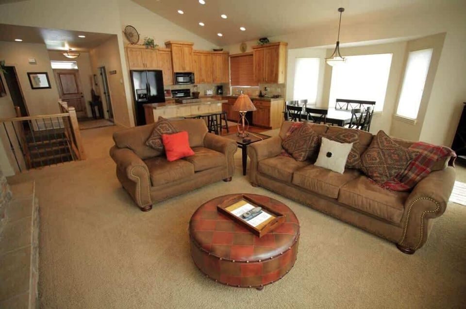 Great room with view to kitchen and dining table